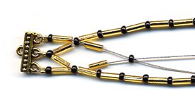 Golden Bugle Bead Bracelet